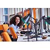 happy young curly  business woman in the modern office