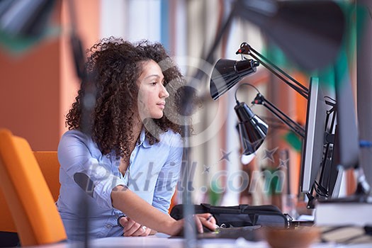 happy young curly business woman in the modern office happy young curly business woman in the modern office