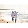 happy young couple in white clothing  have romantic recreation and   fun at beautiful beach on  vacations