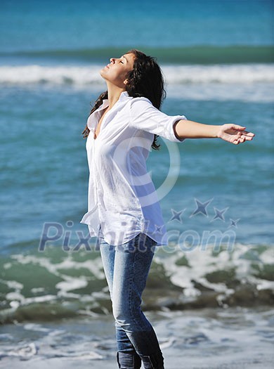 happy young woman relax onbeautiful beach at morning happy young woman relax onbeautiful beach at morning