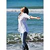 happy young woman relax onbeautiful  beach at morning