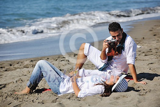 happy young couple relaxing in nature white making photos and taking images and posing for camera happy young couple relaxing in nature white making photos and taking images and posing for camera
