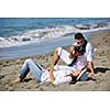 happy young couple relaxing in nature white making photos and taking images and posing for camera