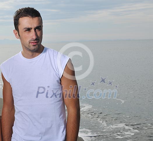 young man have good time and relax at beautifu beach at seaside young man have good time and relax at beautifu beach at seaside