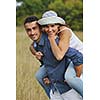 happy young couple have romantic time outdoor while smiling and hug
