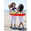 happy young people group have fun  run and jump  on beach beautiful sand  beach