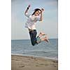 happy young couple have fun and romantic moments on beach at summer season and representing happynes and travel concept