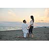 happy young couple have fun and romantic moments on beach at summer season and representing happynes and travel concept