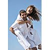 happy young couple have fun and romantic moments on beach at summer season and representing happynes and travel concept