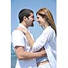 happy young couple have fun and romantic moments on beach at summer season and representing happynes and travel concept