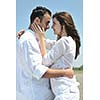 happy young couple have fun and romantic moments on beach at summer season and representing happynes and travel concept