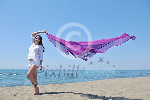 beautiful young woman on beach with scarf relax smile and have fun beautiful young woman on beach with scarf relax smile and have fun