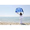 beautiful young woman on beach with scarf relax smile and have fun