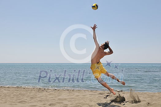 male beach volleyball game player jump on hot sand male beach volleyball game player jump on hot sand