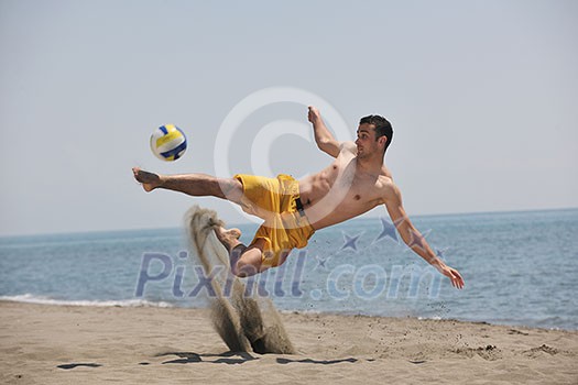 male beach volleyball game player jump on hot sand male beach volleyball game player jump on hot sand