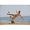 male beach volleyball game player jump on hot sand