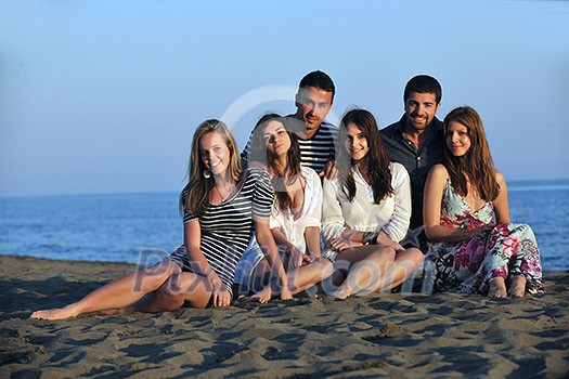 happy young people group have fun run and jump on beach beautiful sand beach happy young people group have fun run and jump on beach beautiful sand beach