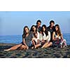 happy young people group have fun  run and jump  on beach beautiful sand  beach