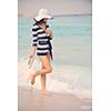 Happy Beautiful Woman Enjoying Summer Vacation on beach