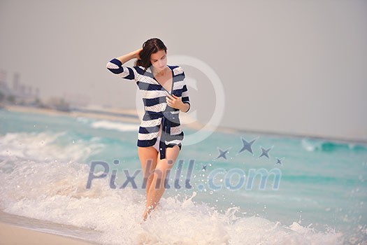 Happy Beautiful Woman Enjoying Summer Vacation on beach Happy Beautiful Woman Enjoying Summer Vacation on beach