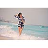 Happy Beautiful Woman Enjoying Summer Vacation on beach