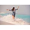 Happy Beautiful Woman Enjoying Summer Vacation on beach