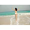 Happy Beautiful Woman Enjoying Summer Vacation on beach