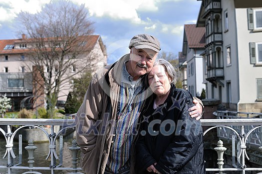 Elderly couple relaxing on a sunny day together Elderly couple relaxing on a sunny day together