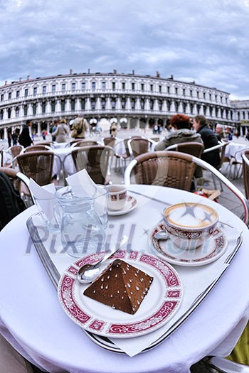 cup of coffee cappucinno drink in outdoor restaurant
