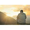 healthy young man practice yoga in height mountain at early morning and sunrise