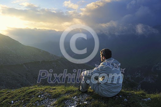 healthy young man practice yoga in height mountain at early morning and sunrise healthy young man practice yoga in height mountain at early morning and sunrise