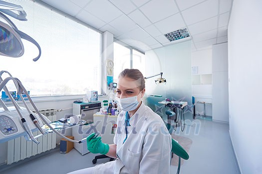 portrait of a dentist smiling at the camera portrait of a dentist smiling at the camera