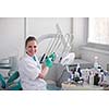portrait of a dentist  smiling at the camera