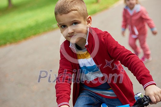 Young boy on the bicycle at Park Young boy on the bicycle at Park
