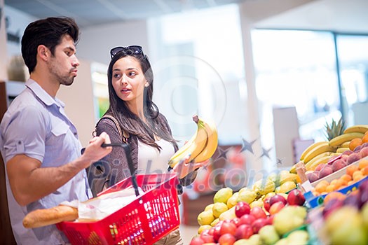 Young couple shopping in a supermarket Young couple shopping in a supermarket