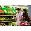 Young couple shopping in a supermarket