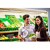 Young couple shopping in a supermarket