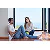 romantic happy young couple relax at modern home staircase indoors