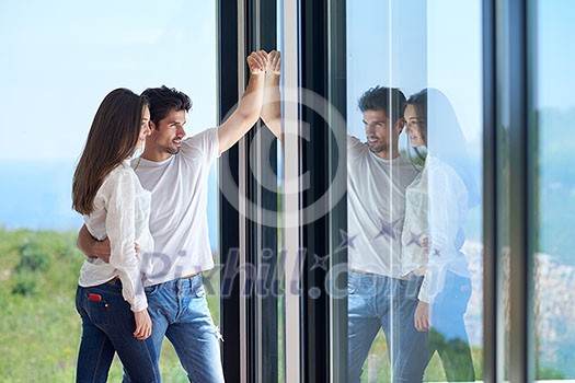 romantic happy young couple relax at modern home staircase indoors romantic happy young couple relax at modern home staircase indoors