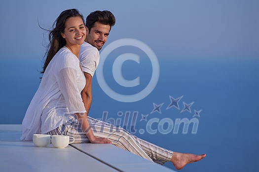 happy young romantic couple have fun relax smile at modern home outdoor terace balcony terace happy young romantic couple have fun relax smile at modern home outdoor terace balcony terace
