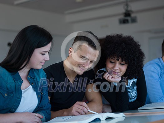 happy students group study in classroom happy students group study in classroom