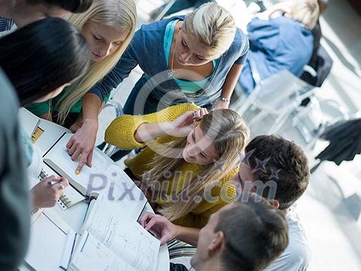 happy students group study in classroom happy students group study in classroom