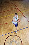 one healthy young  man play basketball game in school gym indoor