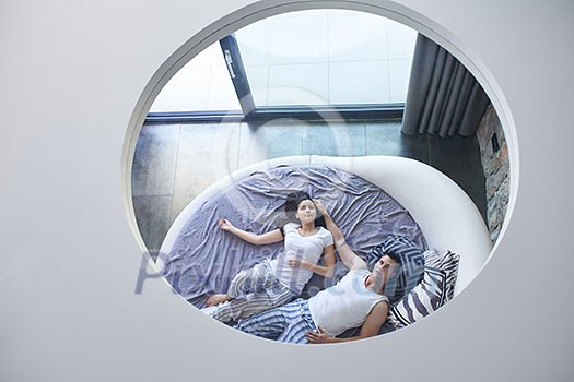 happy young couple relax and have fun in bed happy young couple relax and have fun in bed