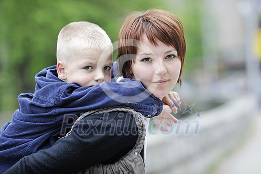 happy young mother and son have fun outdoor happy young mother and son have fun outdoor