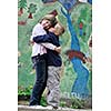 happy family sister and brother have fun and play games outdoor in park