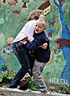 happy family sister and brother have fun and play games outdoor in park