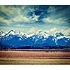 Vintage retro hipster style travel image of Bavarian Alps countryside lake landscape. Bavaria, Germany