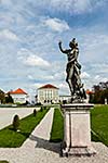 Statue Grand Parterre Baroque garden and the rear view of the Nymphenburg Palace. Munich, Bavaria, Germany