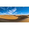 Panorama of dunes landscape with dramatic clouds in Thar Desert. Sam Sand dunes, Rajasthan, India